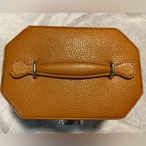 NWOT light brown travel vinyl jewelry case.